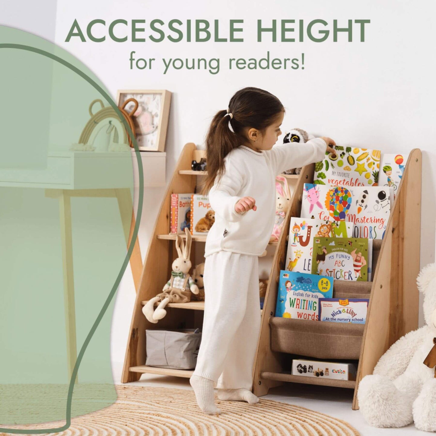 Child reaching for books on Goodevas 2in1 Montessori Shelf