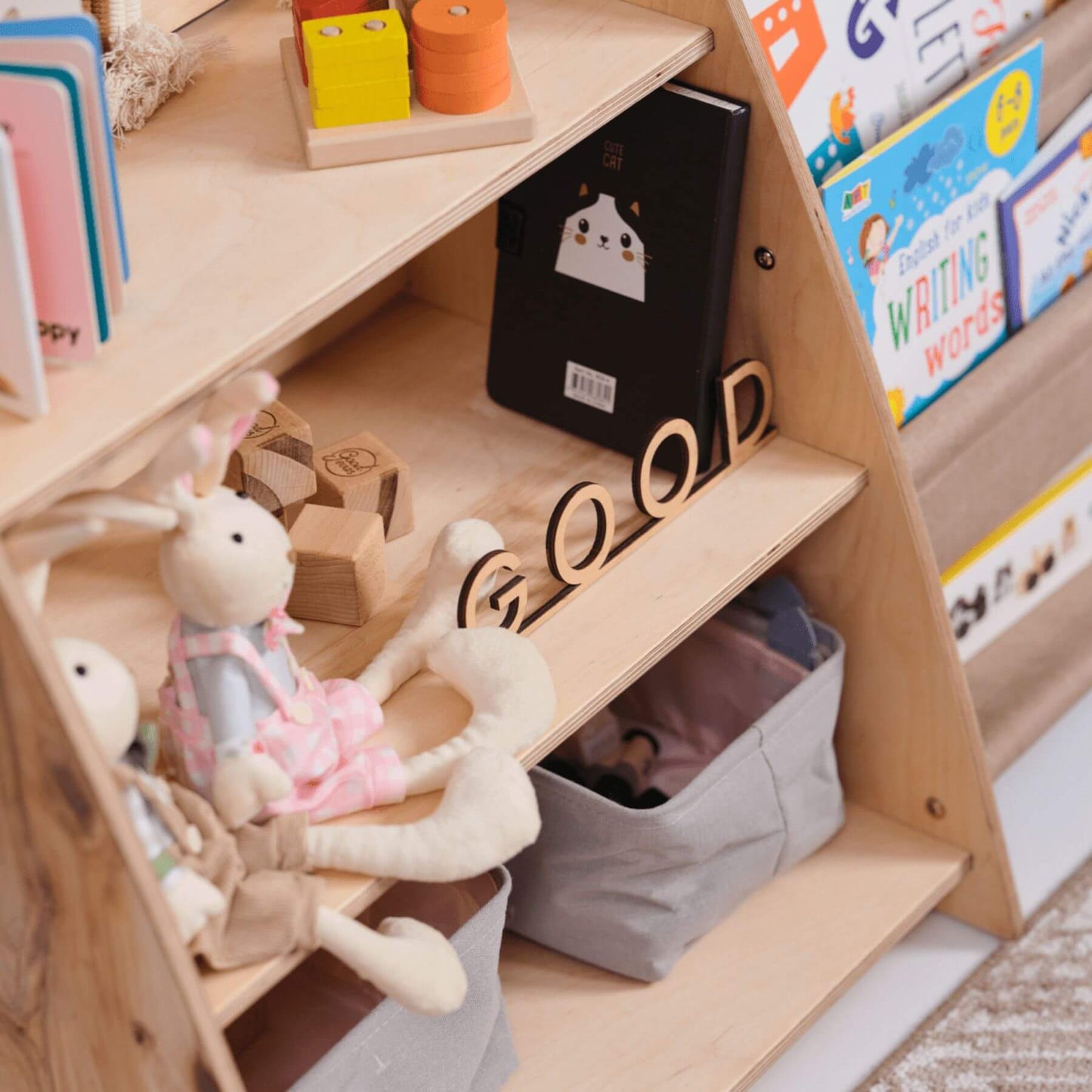 Goodevas 2in1 Montessori Shelf with toys, books, and educational materials in a child's room.