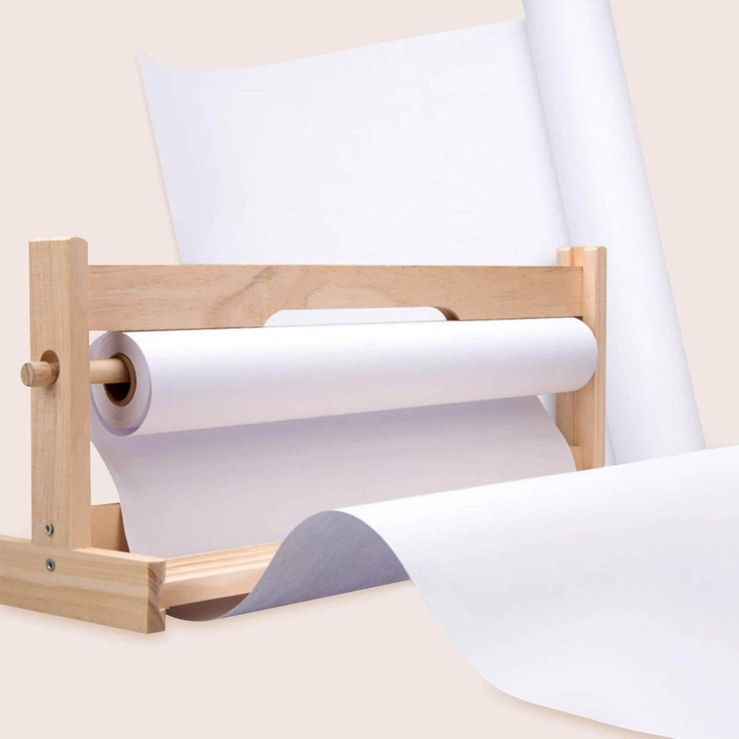 Wooden paper roller with a roll of white paper on a light beige background