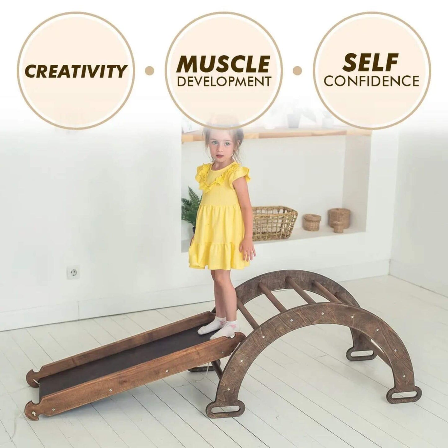 Child on Goodevas Montessori Climbing Set Chocolate with text labels for creativity, muscle development, and self-confidence.
