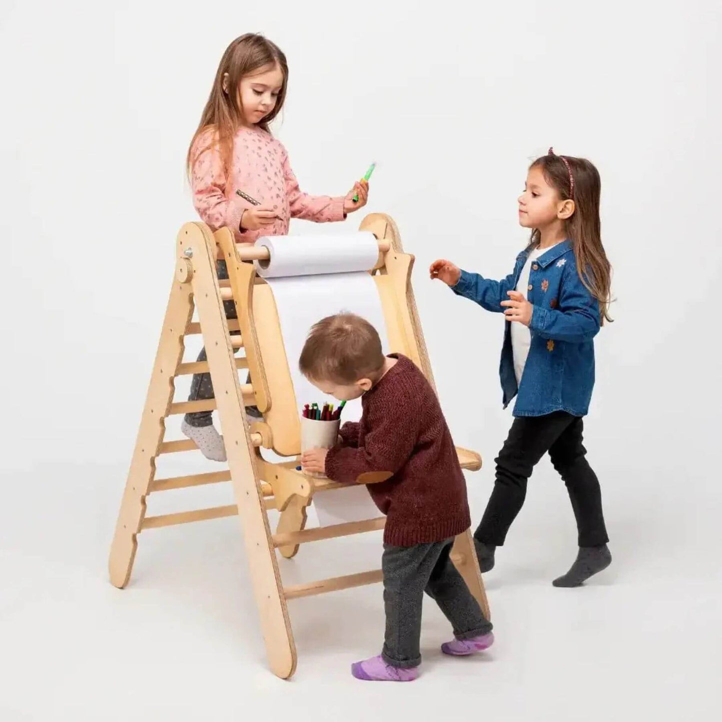 Children playing with Goodevas wooden climber