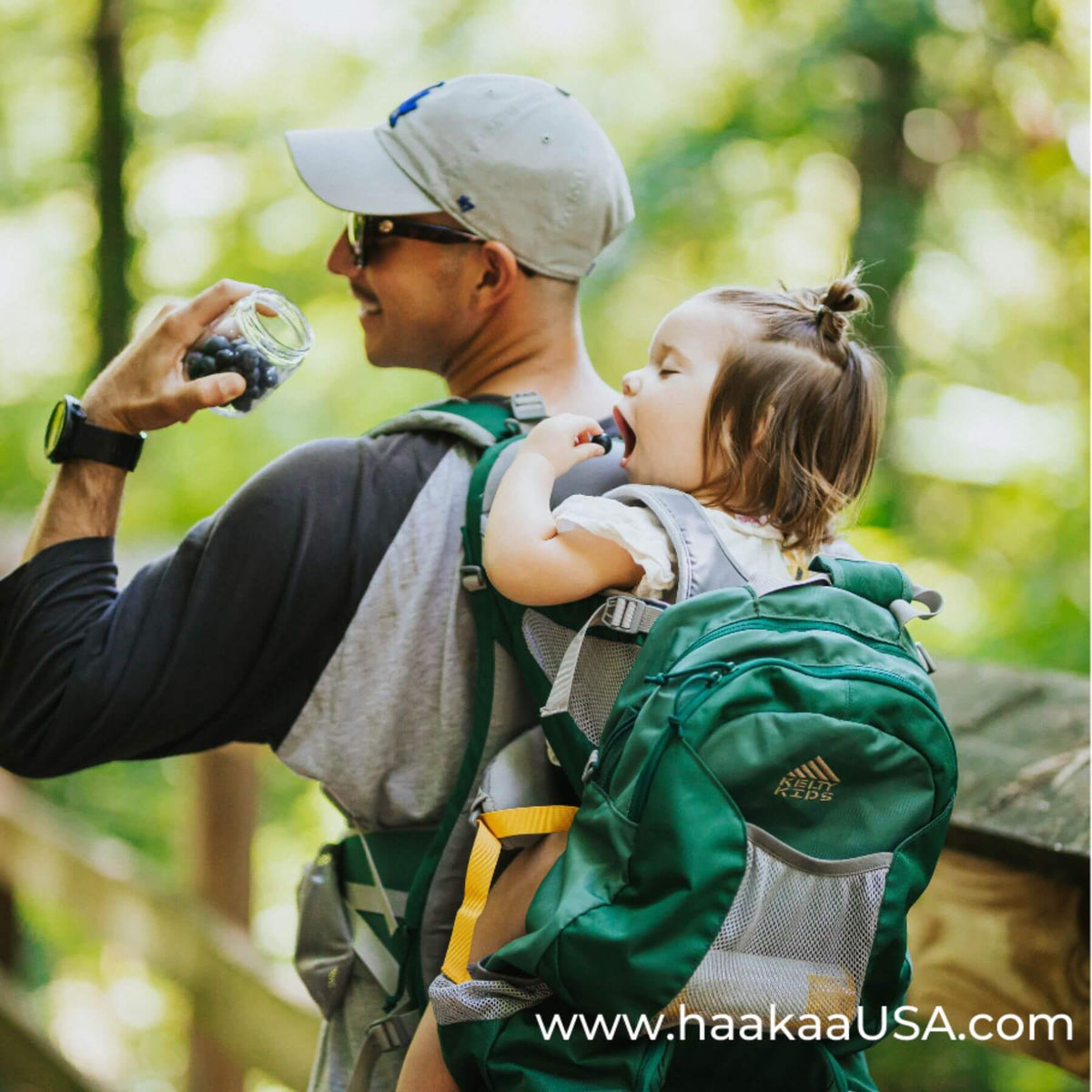 Man carrying girl outdoor