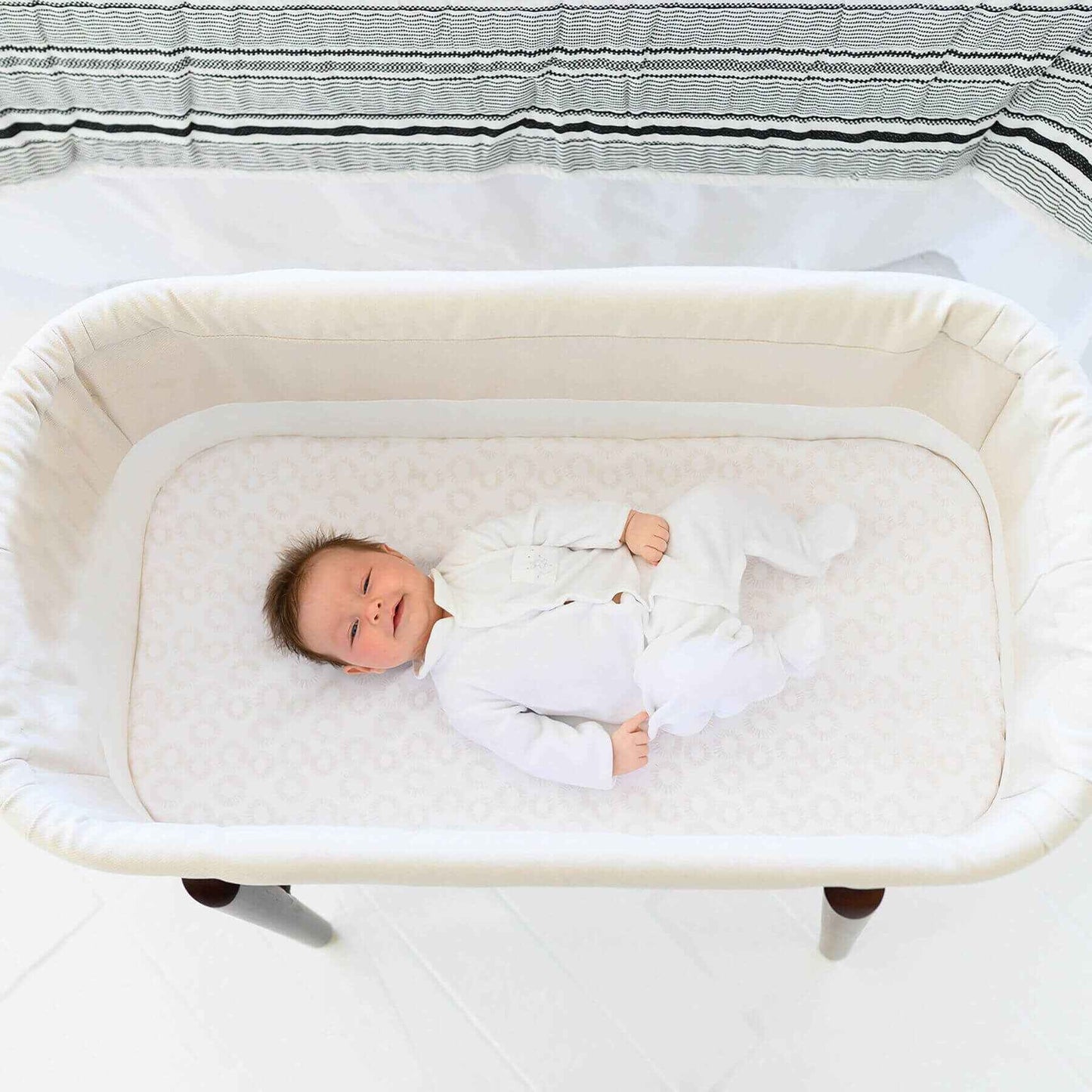 Baby Sleeping in TruBliss SOVA Bassinet Irish Cream