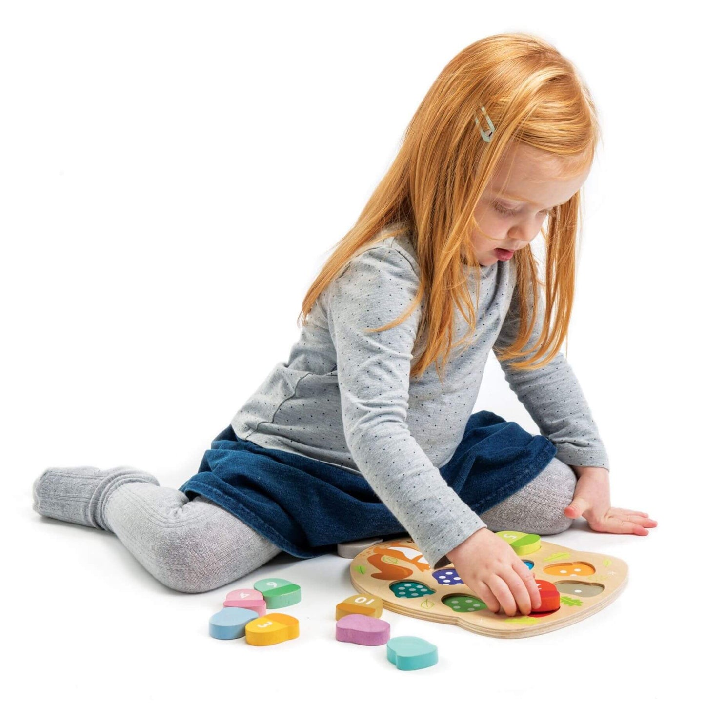 Child playing with Tender Leaf Bright Minds Math Collection - Acorns