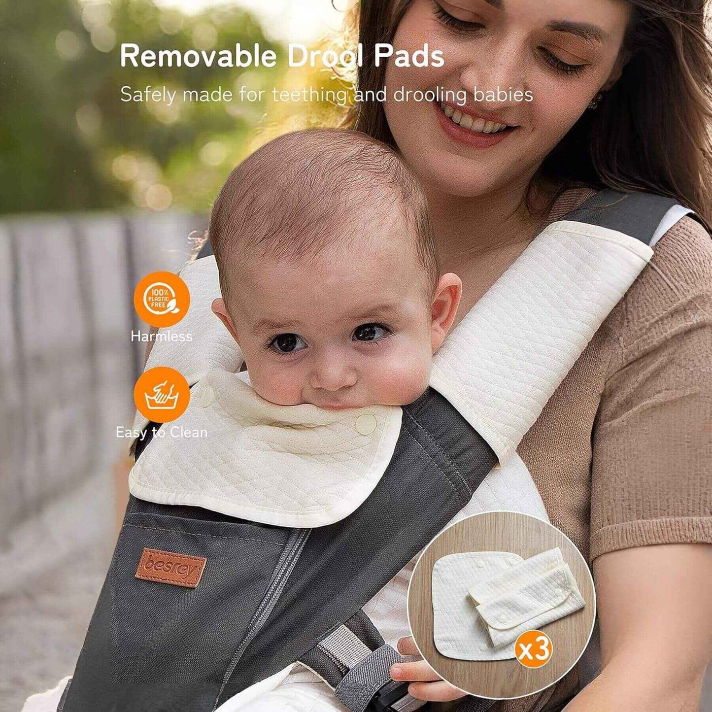 Woman holding a baby in Besrey Carrier with Front Facing Holder, outdoors.