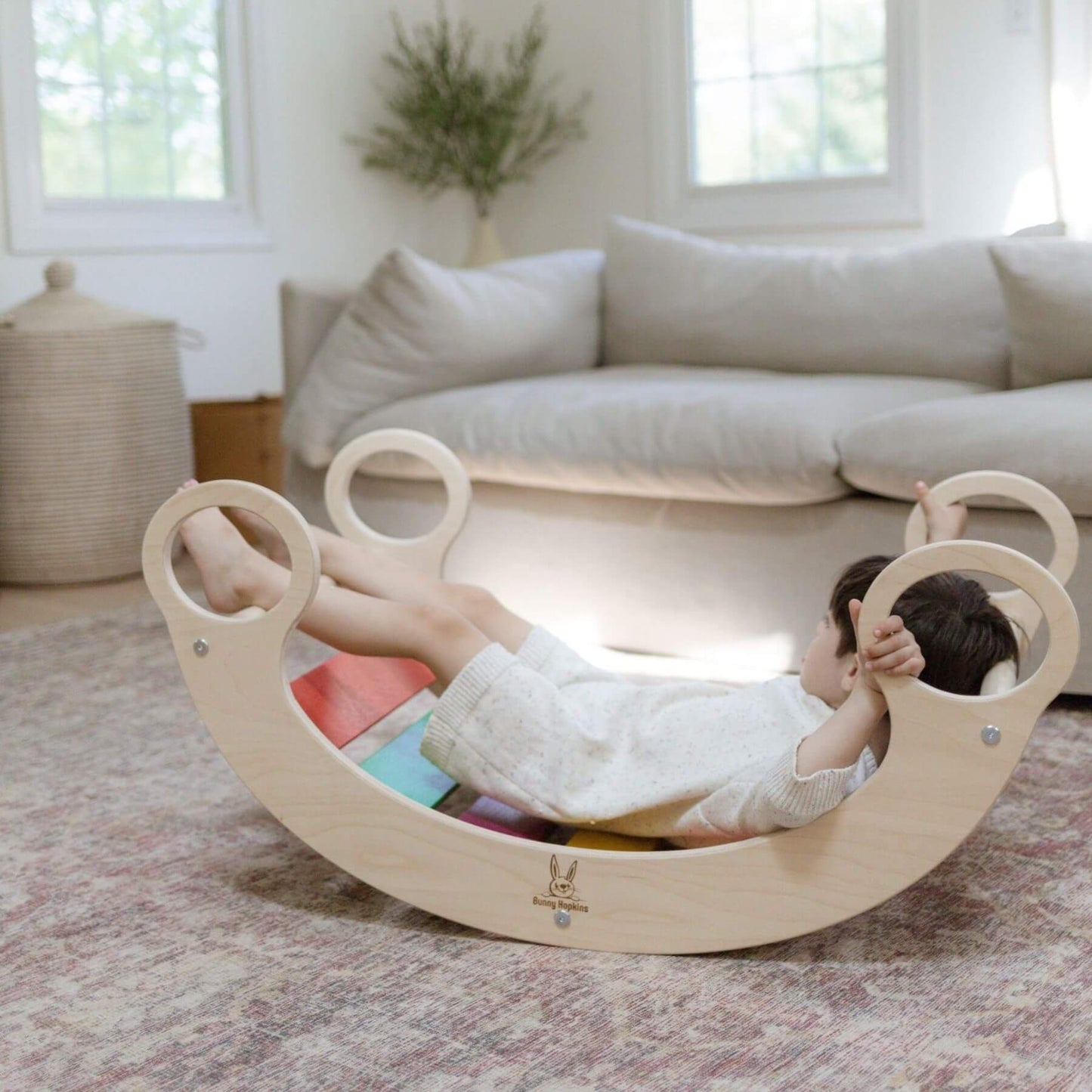 Boy Lying on Bunny Hopkins Climbing Arch