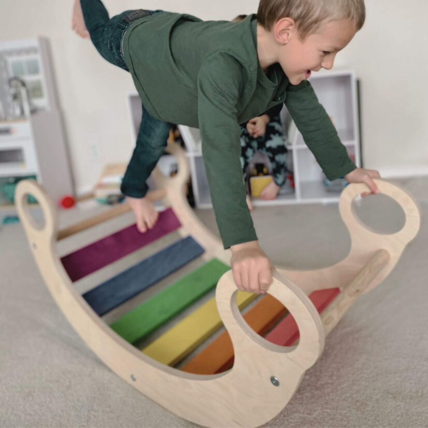 Boy Playing on Bunny Hopkins Climbing Arch Blush