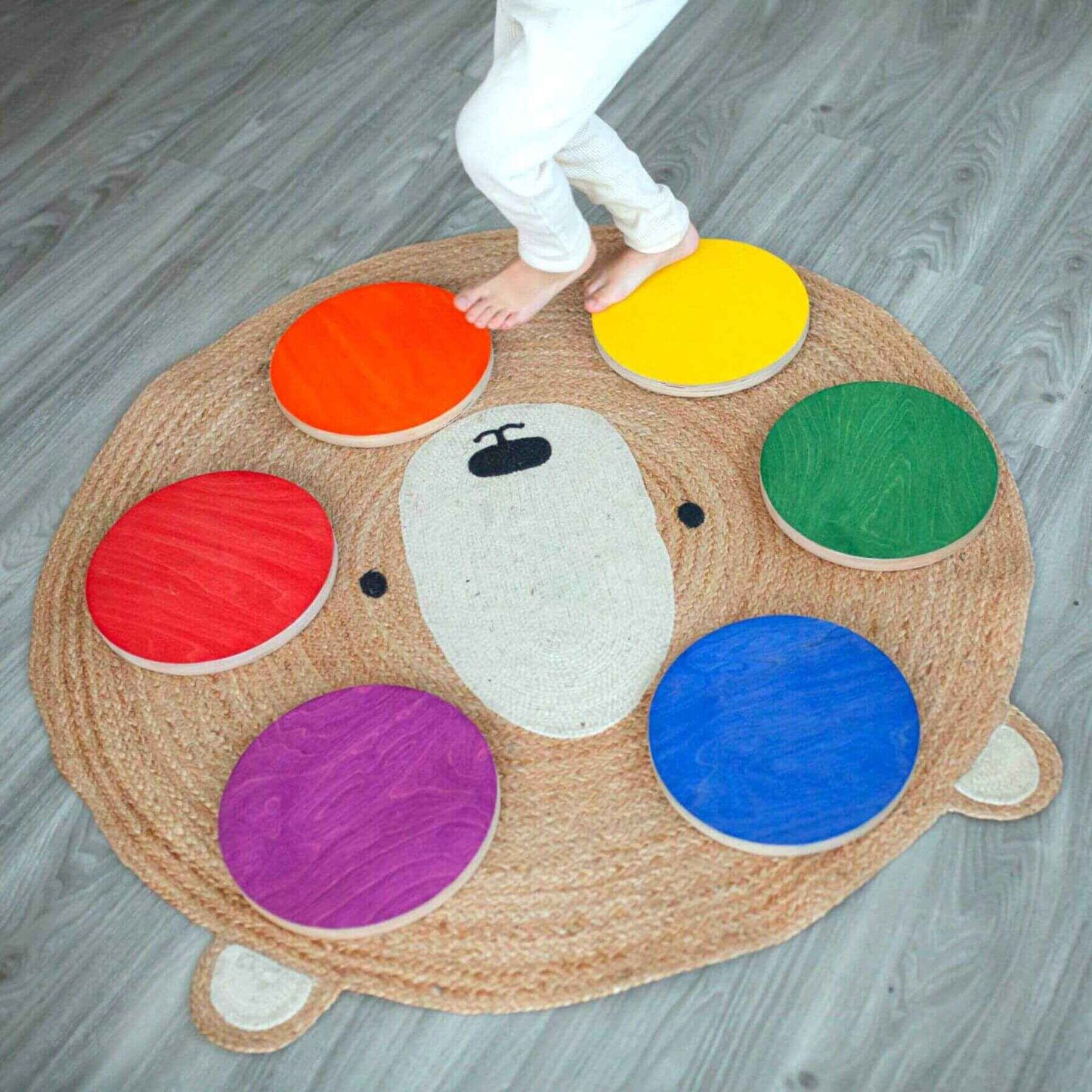 Bunny Hopkins Stepping Stones on a wooden floor.