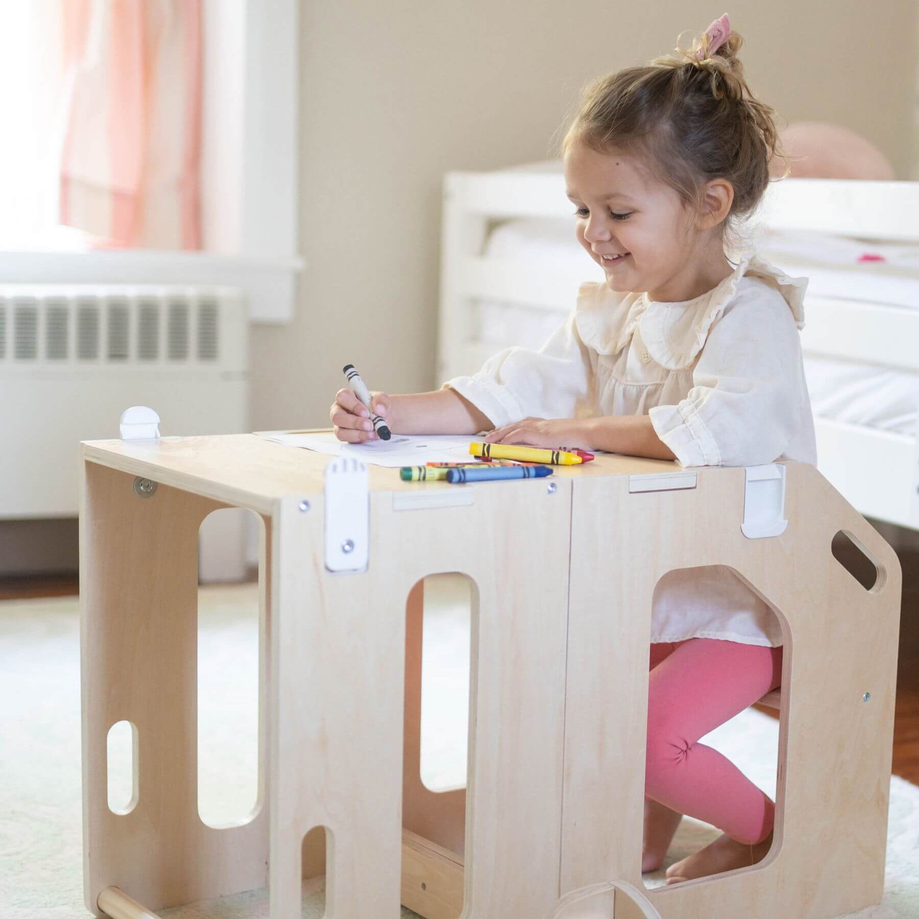 Girl Studying, Sitting on Busy Kids 2-In-1 Kitchen Tower and Kids Art Desk