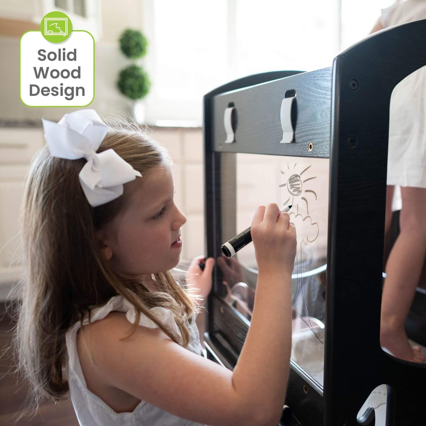 Girl Drawing on the Plexi-Glass Panel of Little Partners Chef Series Learning Tower Charcoal