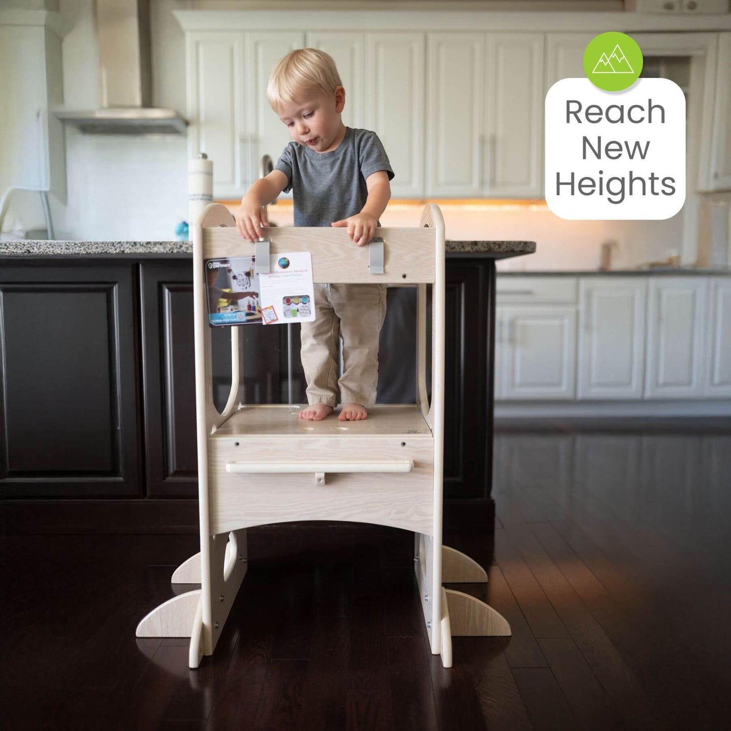 Boy Standing on Little Partners Chef Series Learning Tower Natural