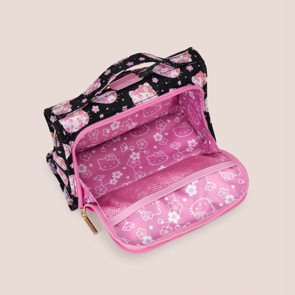 Hello Kitty® × JuJuBe Cherry Blossoms Bestie Small Messenger Handbag, revealing a pink interior