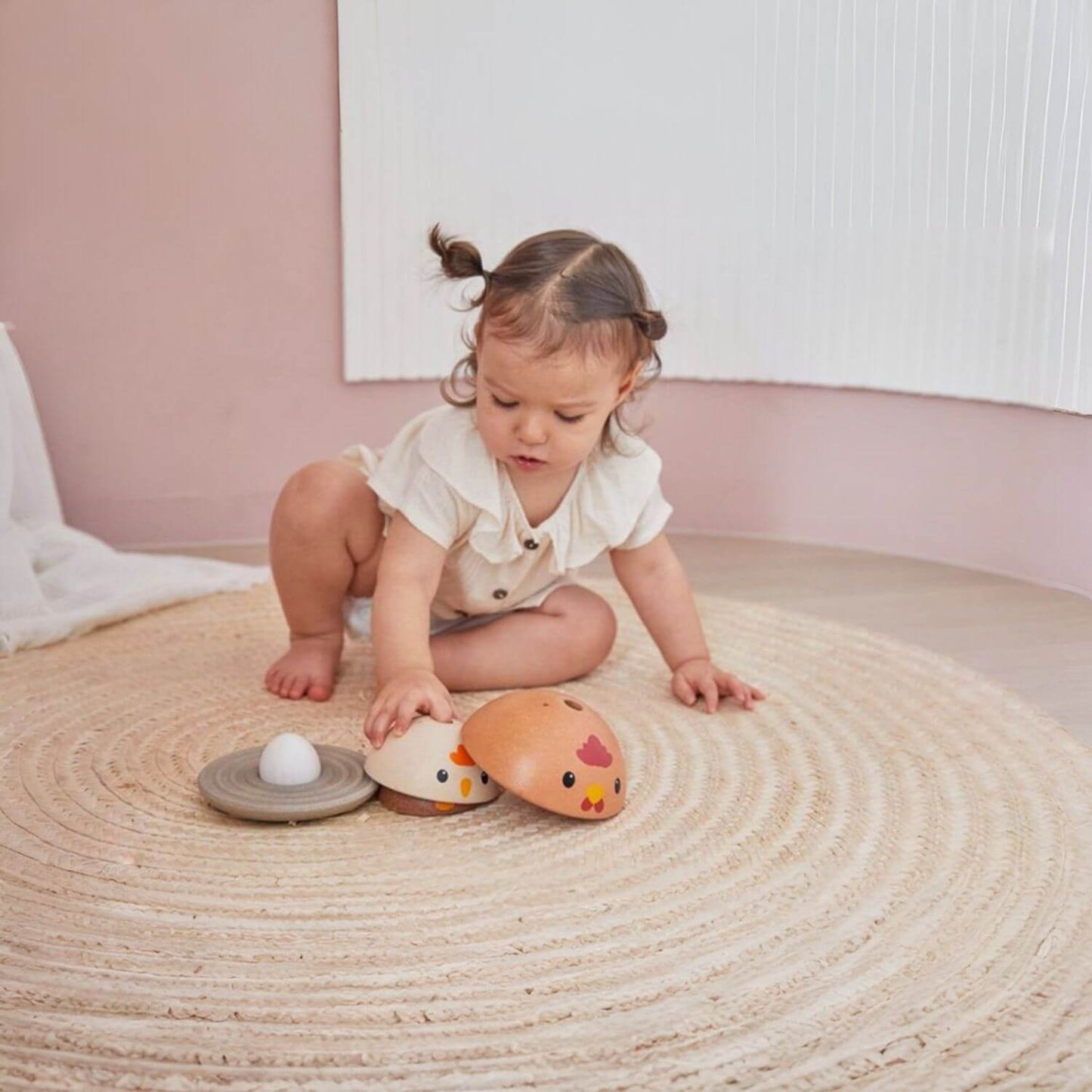 Girl Playing PlanToys Chicken Nesting - Modern Rustic