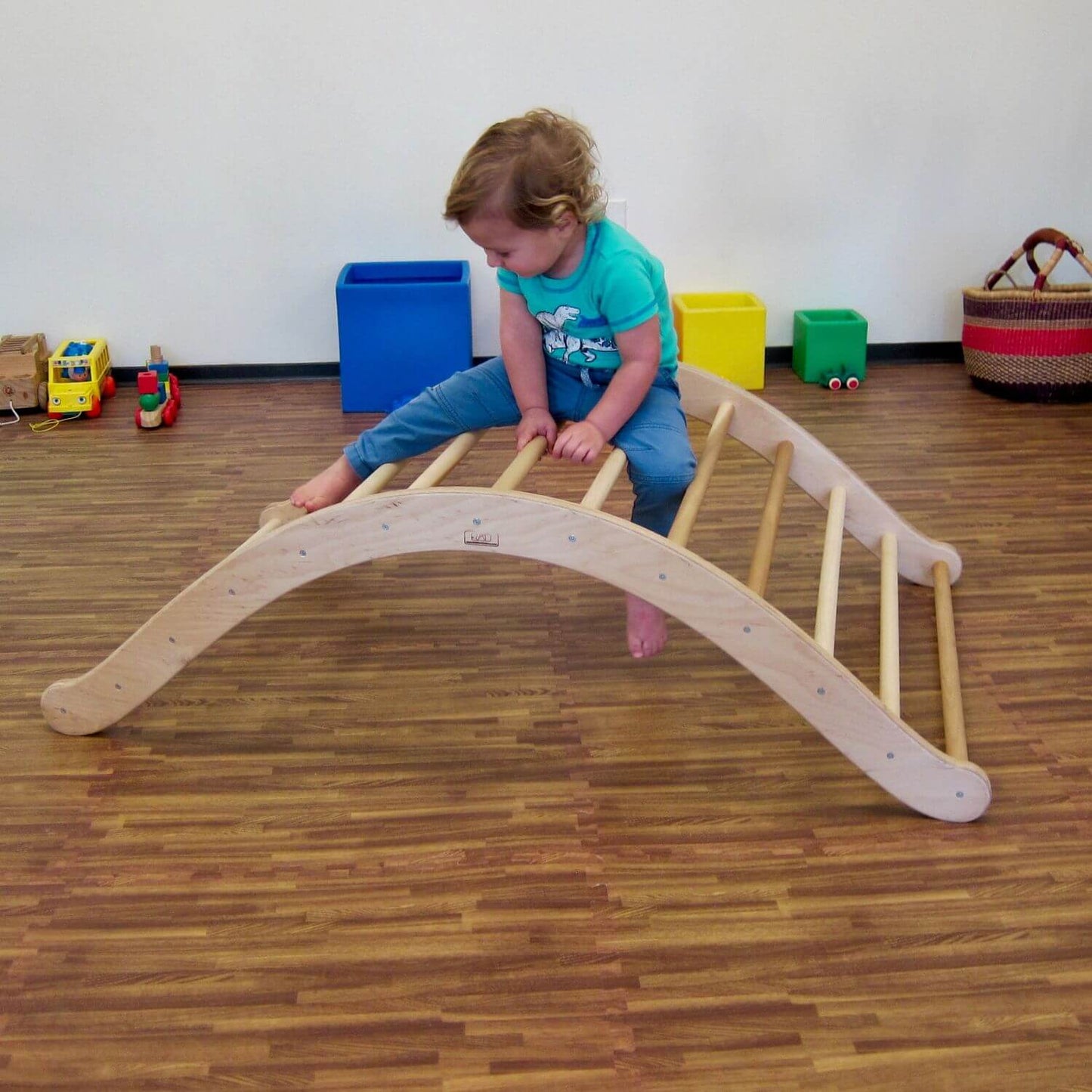Kid Climbing on RAD Children's Furniture Climbing Arch