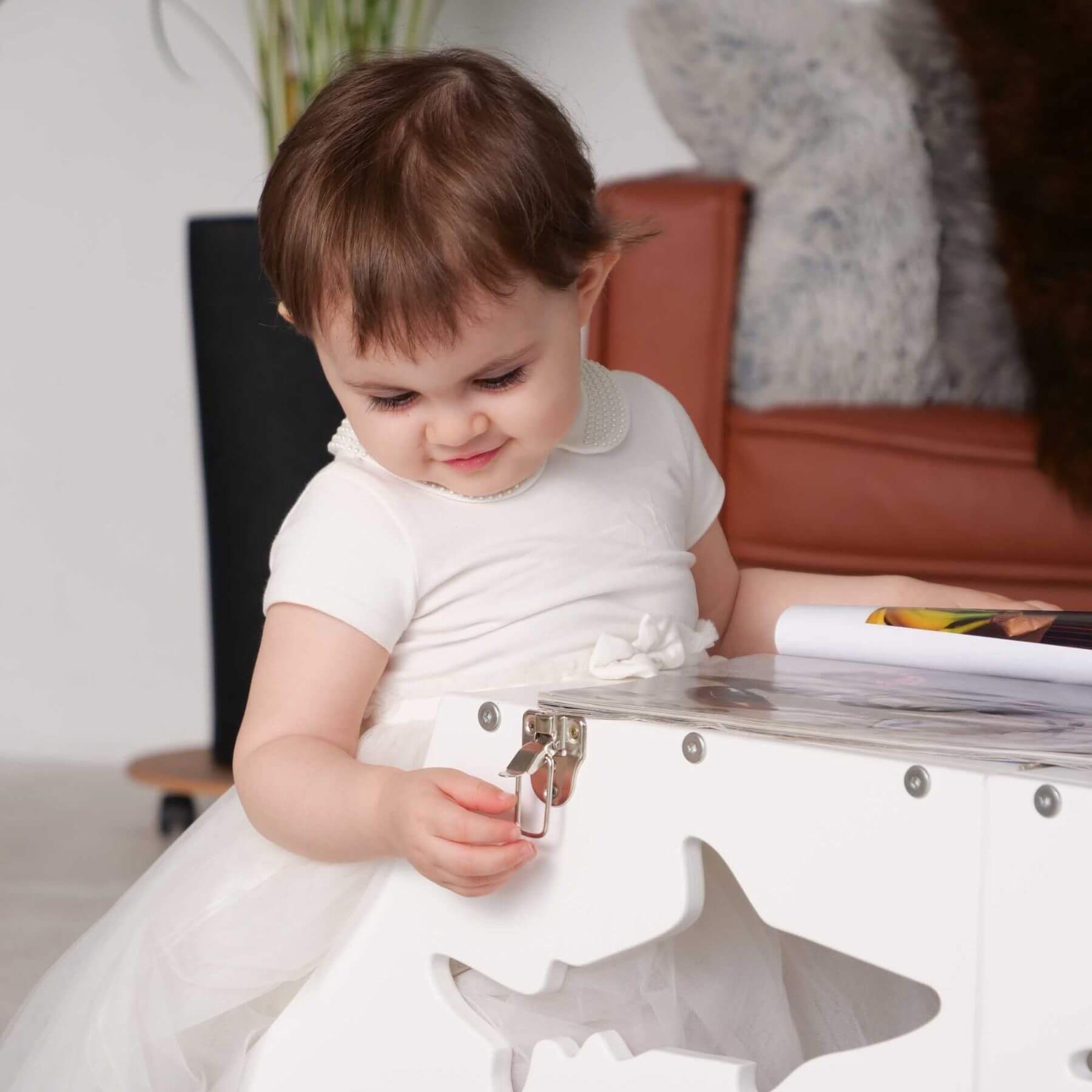 Girl Sitting at Wood and Hearts Convertible Kitchen Tower Shark White