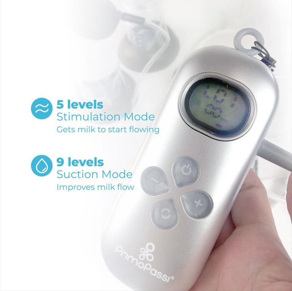 Handheld electronic device with control buttons and display, held by a hand