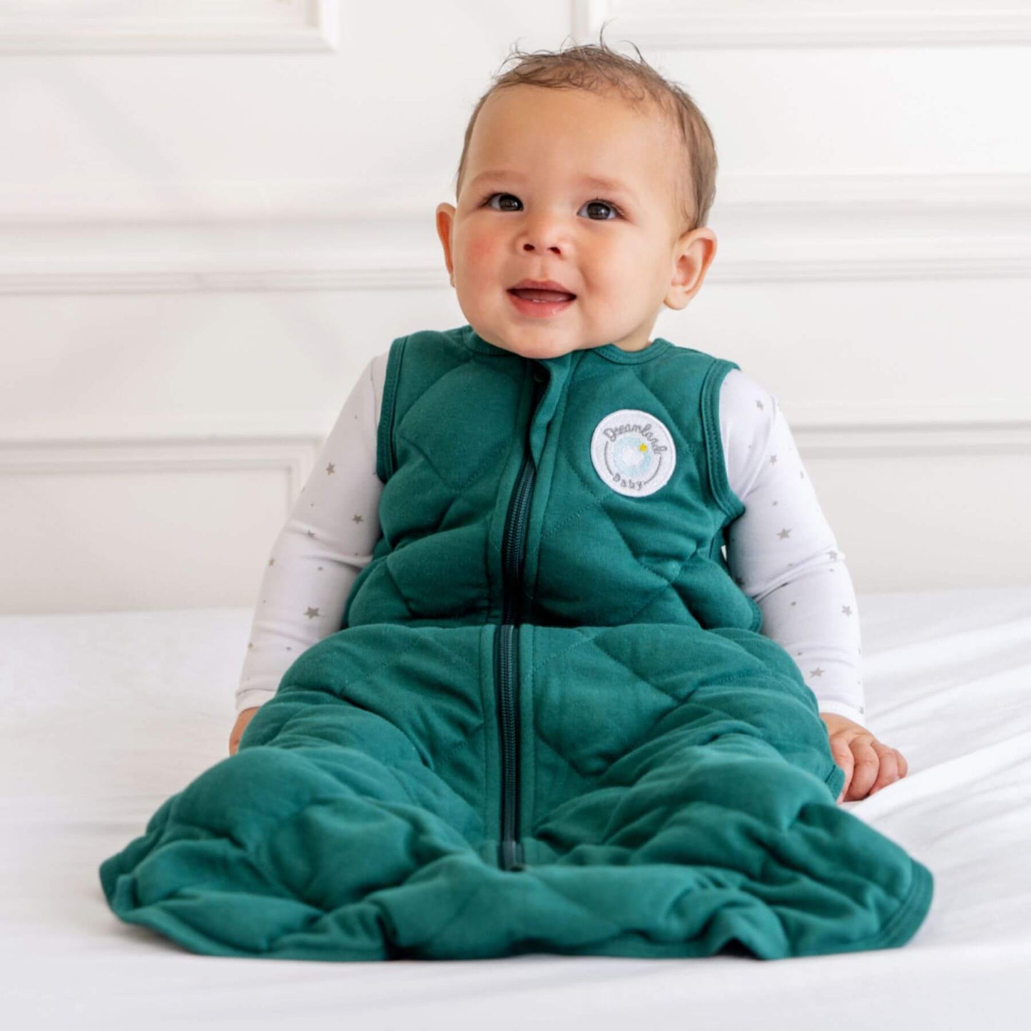 Baby wearing Dreamland Baby Dream Weighted Sleep Sack