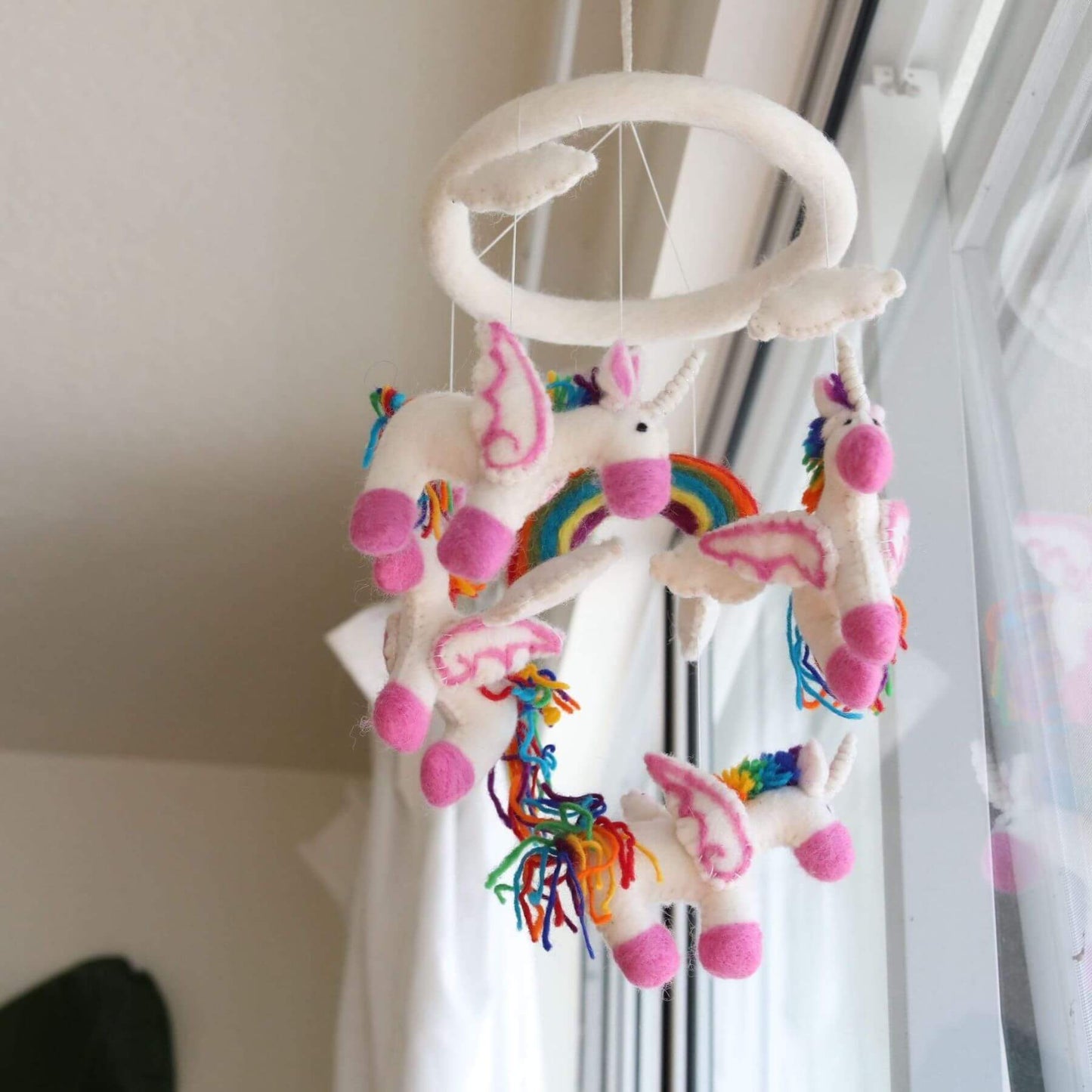 Ganapati Crafts Co. Felt Unicorn Baby Mobile hanging against a neutral background