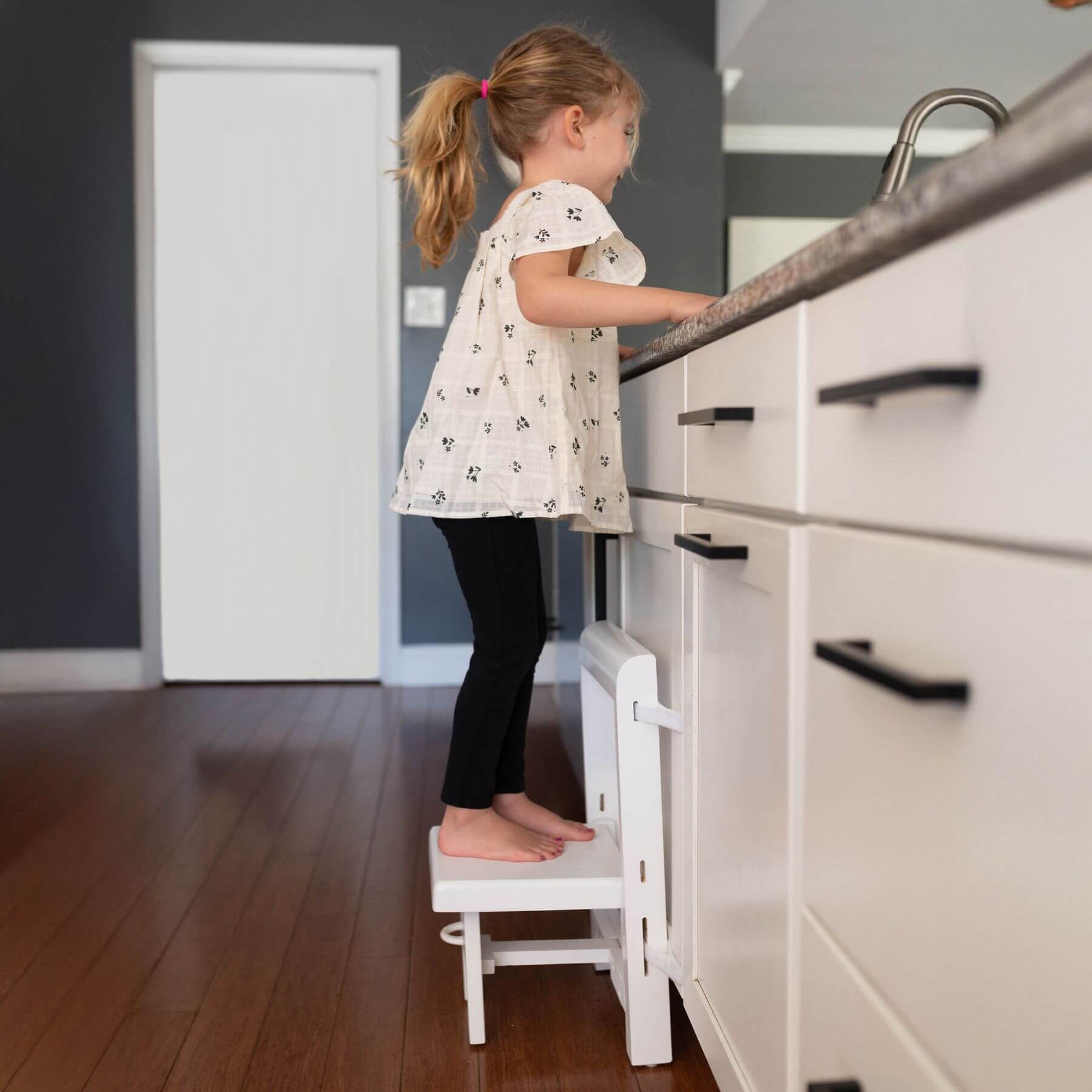 Girl Stepping on Busy Kids Fold 'N Store Step Stool White