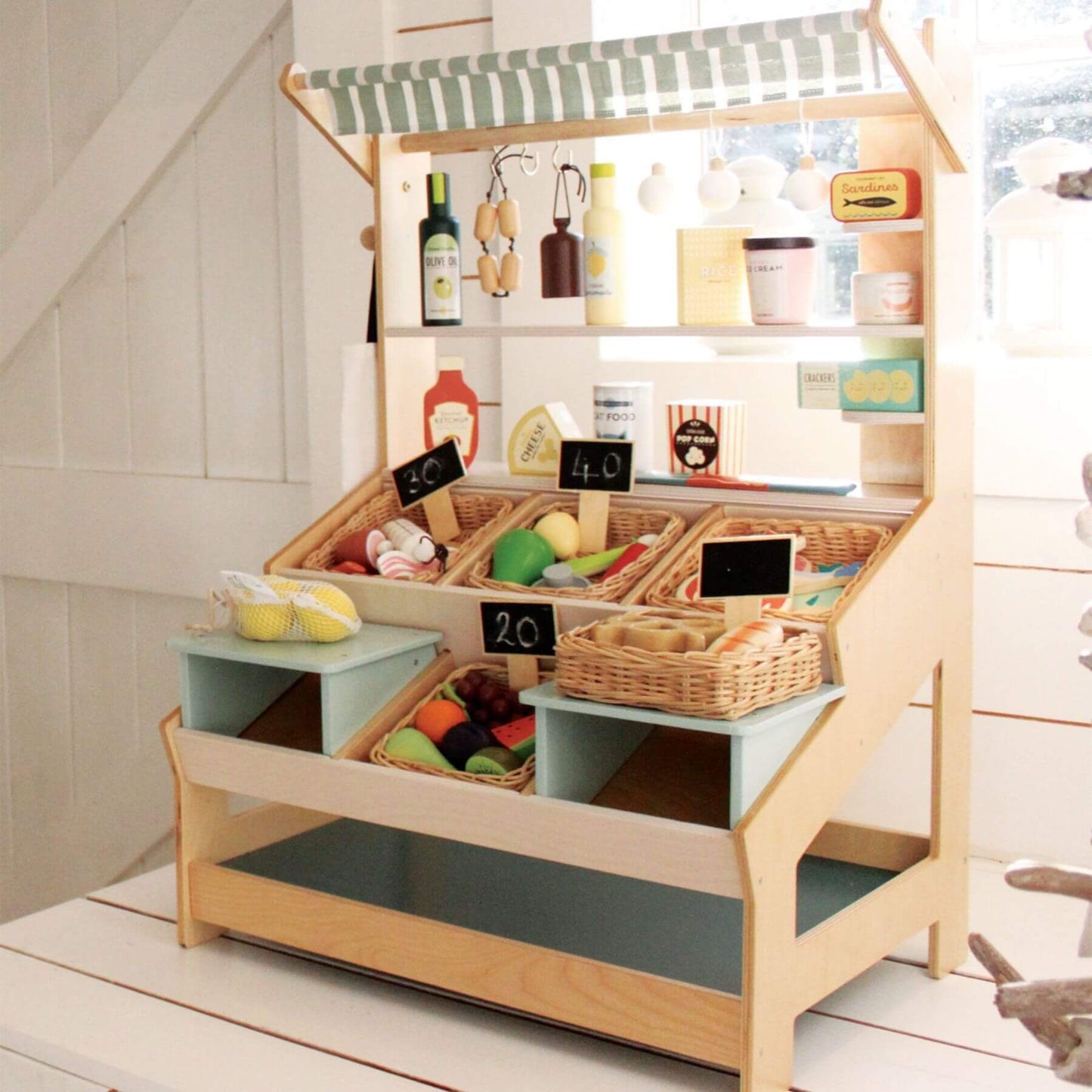 Tender Leaf General Stores with various toys and items on shelves.