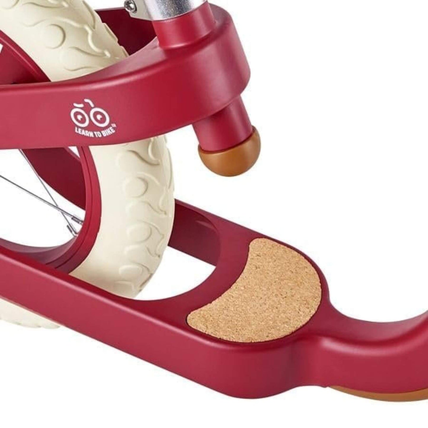 Close-up of Hape Learn to Ride Balance Bike Red