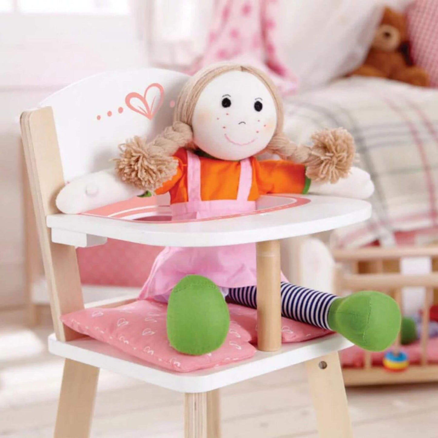Doll Siting on Hape Highchair