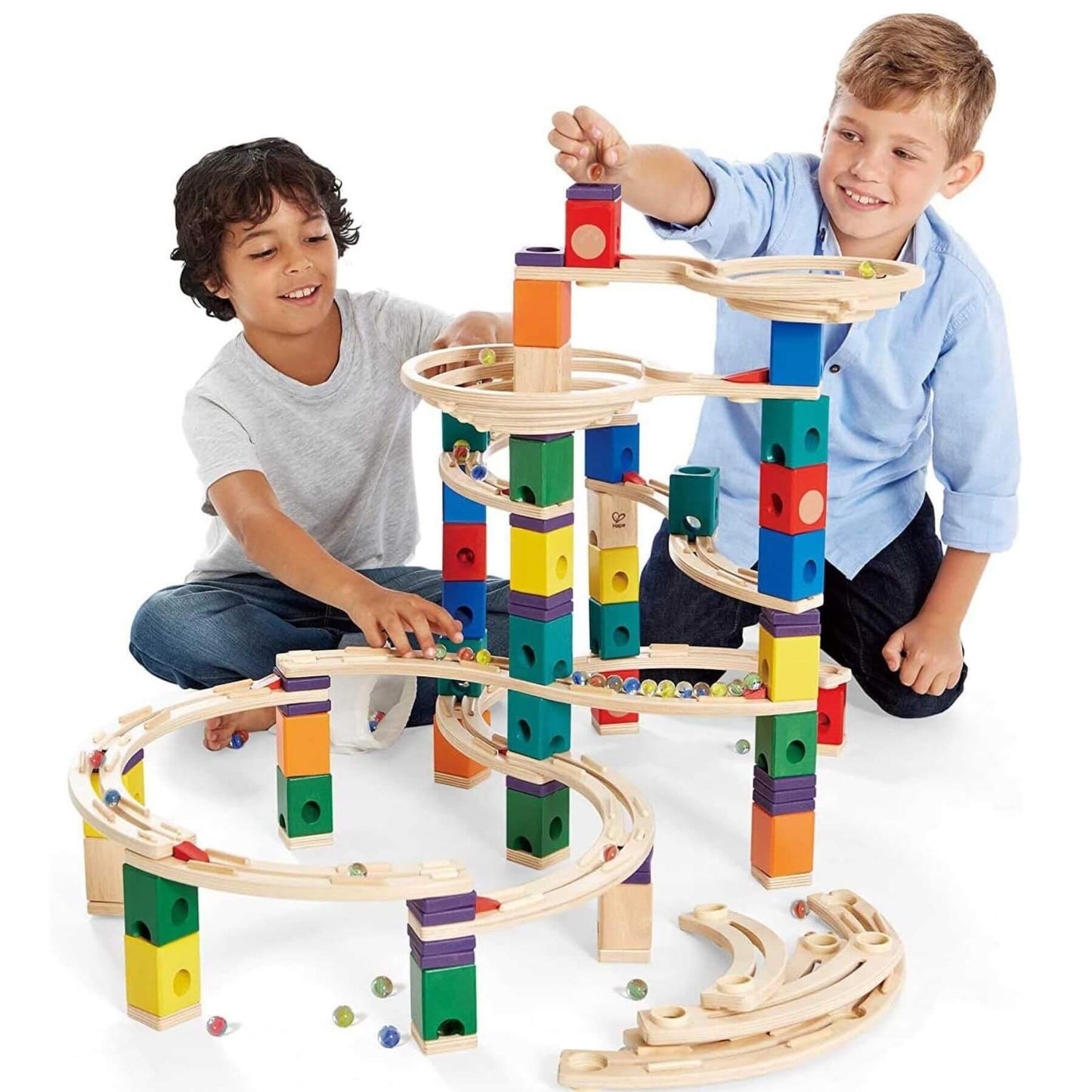 Boys Playing Hape Quadrilla Cyclone Wooden Marble Run Blocks