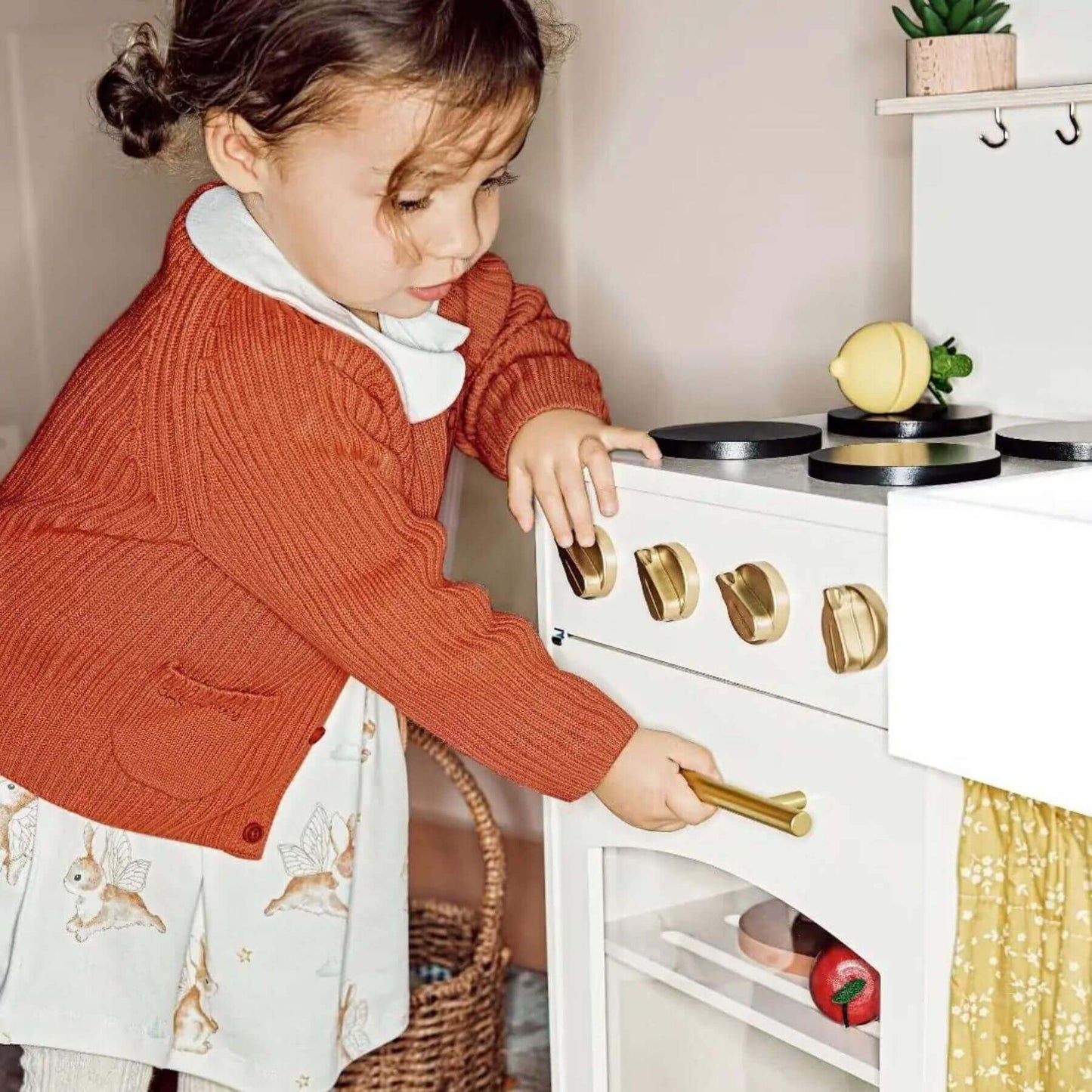 Child playing with Tiny Land® Honey Kitchenette - Little Chef's First Kitchen