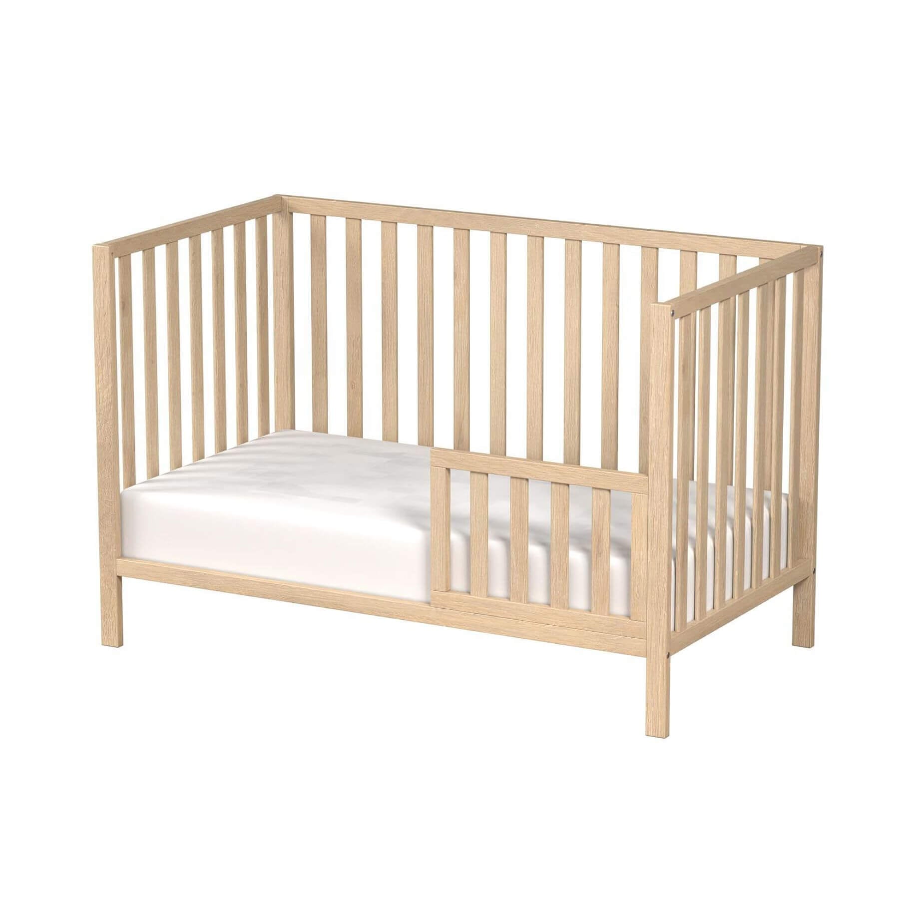 Ivey 3-in-1 Convertible Crib Light Natural with a white mattress