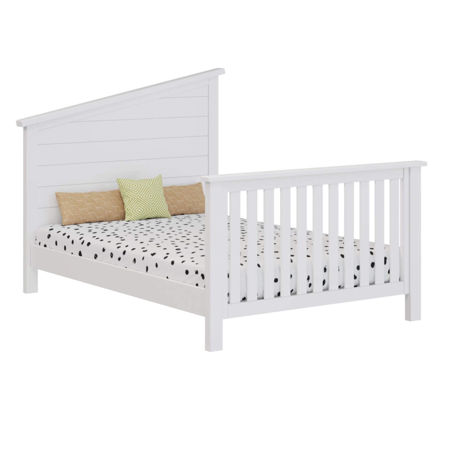 White wooden bed with polka dot bedding and colorful pillows