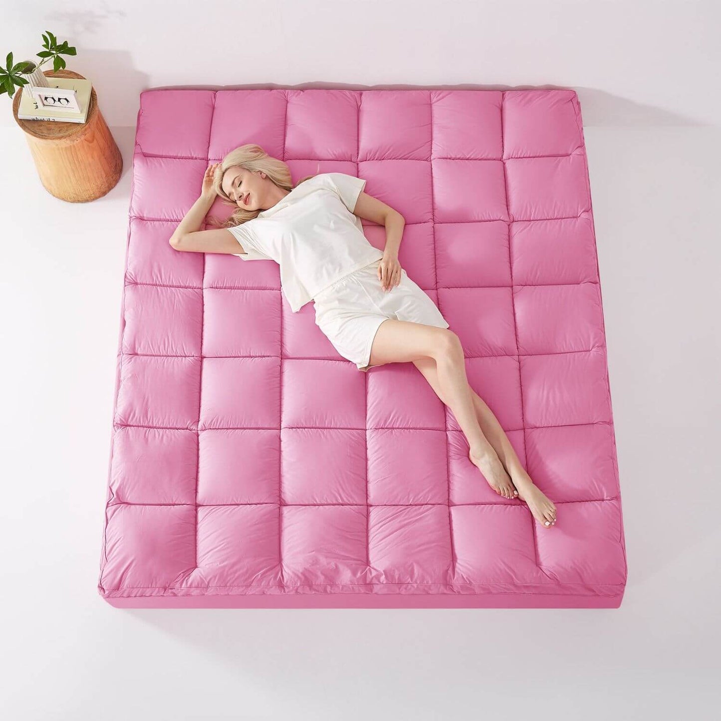 Woman Sleeping on KUB Cooling Mattress Topper Pink
