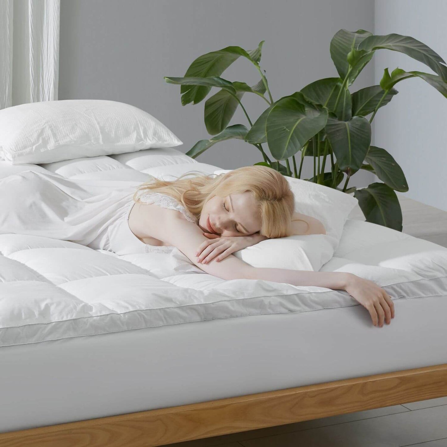 Girl Sleeping on KUB Cooling Mattress Topper White