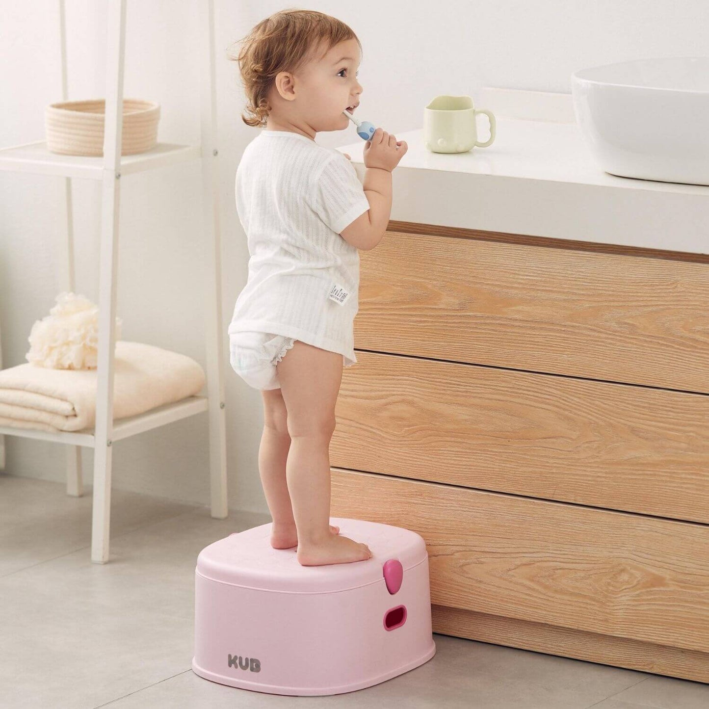 Baby Stepping on KUB Potty Training Toilet Pink