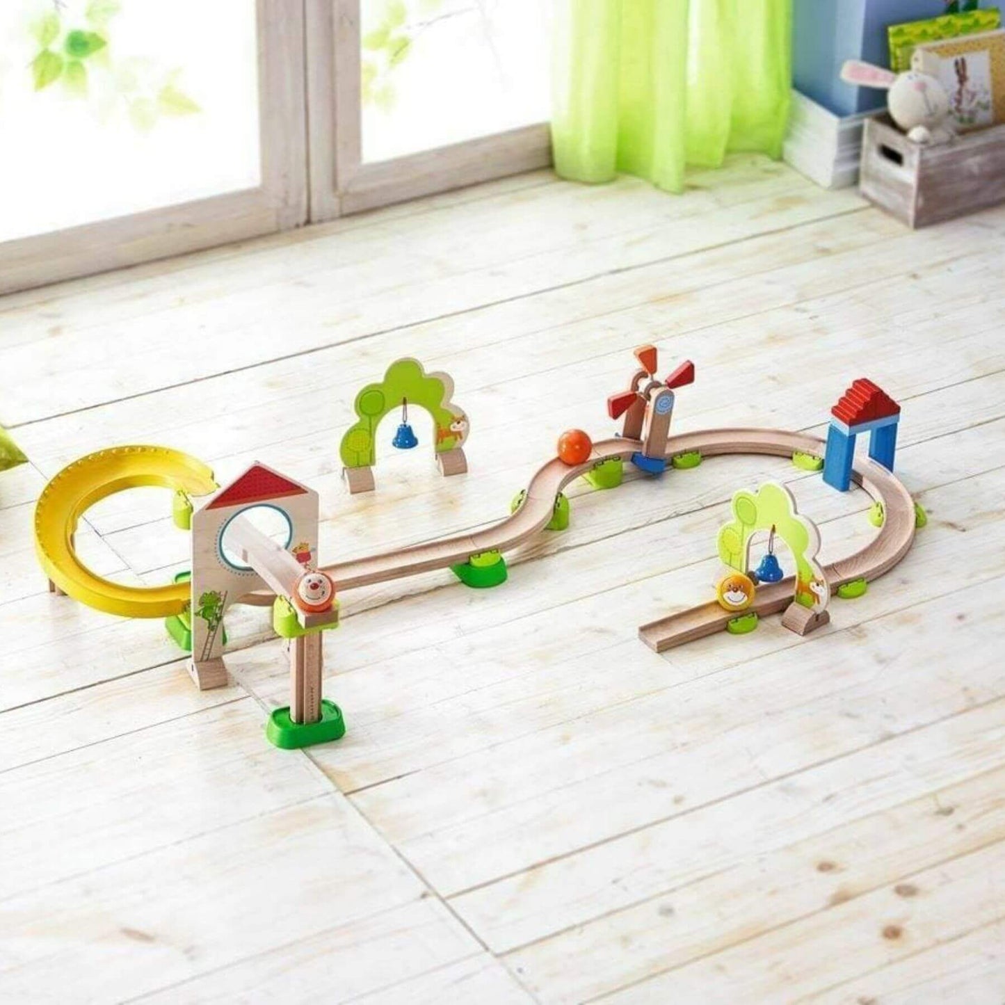 HABA USA Kullerbu Windmill 25 Piece Starter Track Set on a wooden floor with a bright background