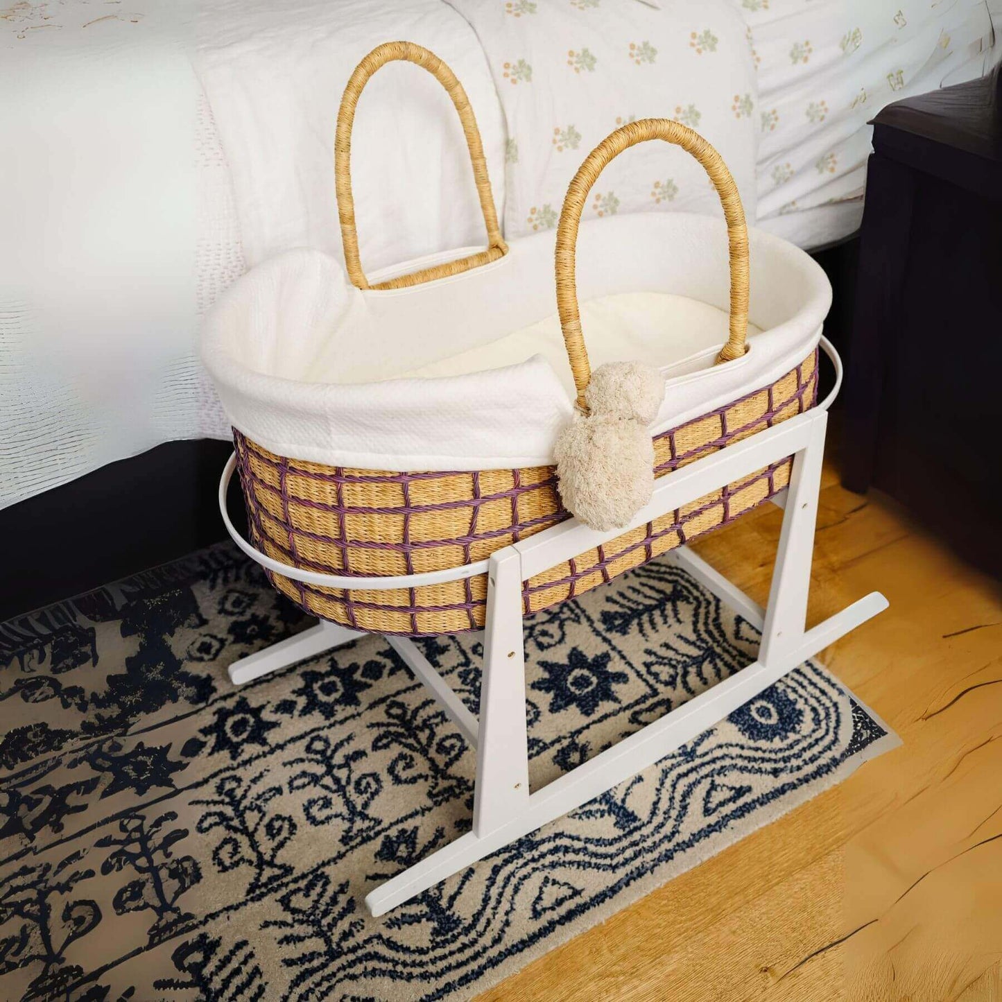 Lavender Grid African Moses Basket Vegan Handle on a stand in a room setting.