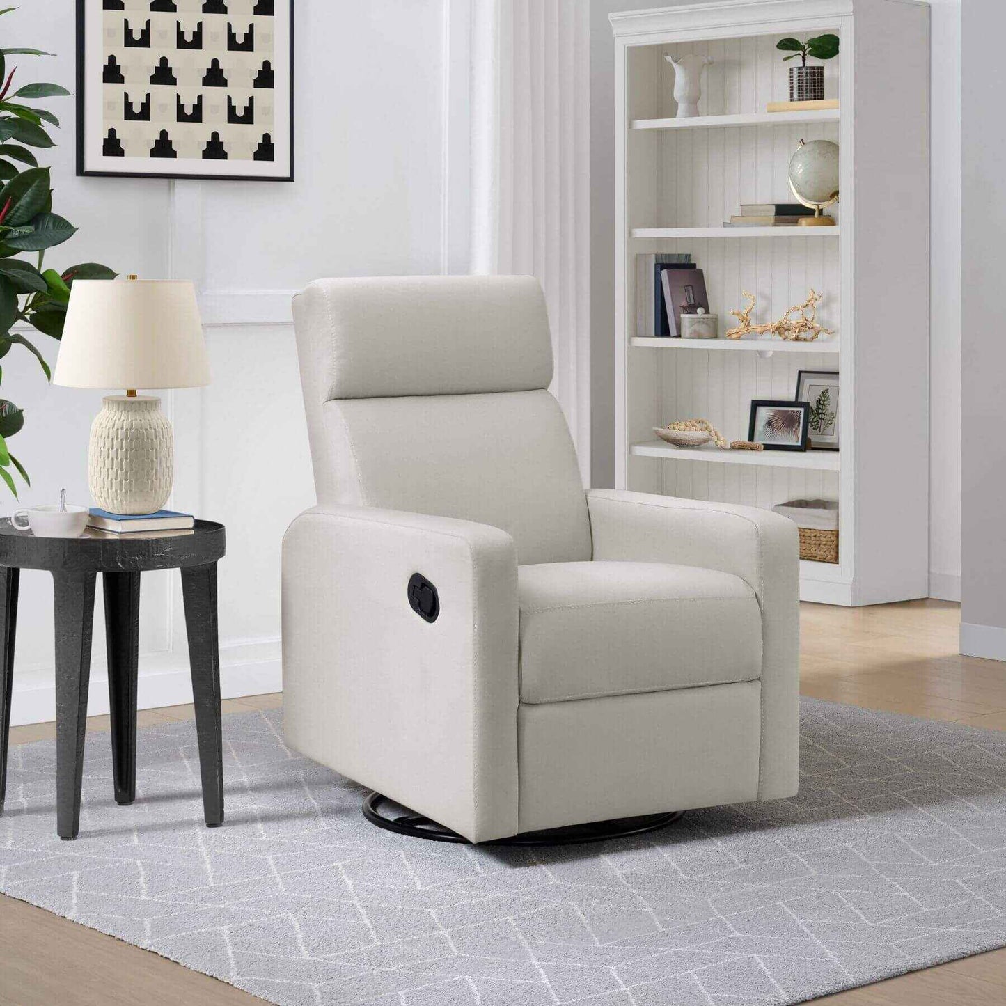 Oxford Baby Layton Glider / Recliner Oatmeal in a living room setting with a side table and lamp.