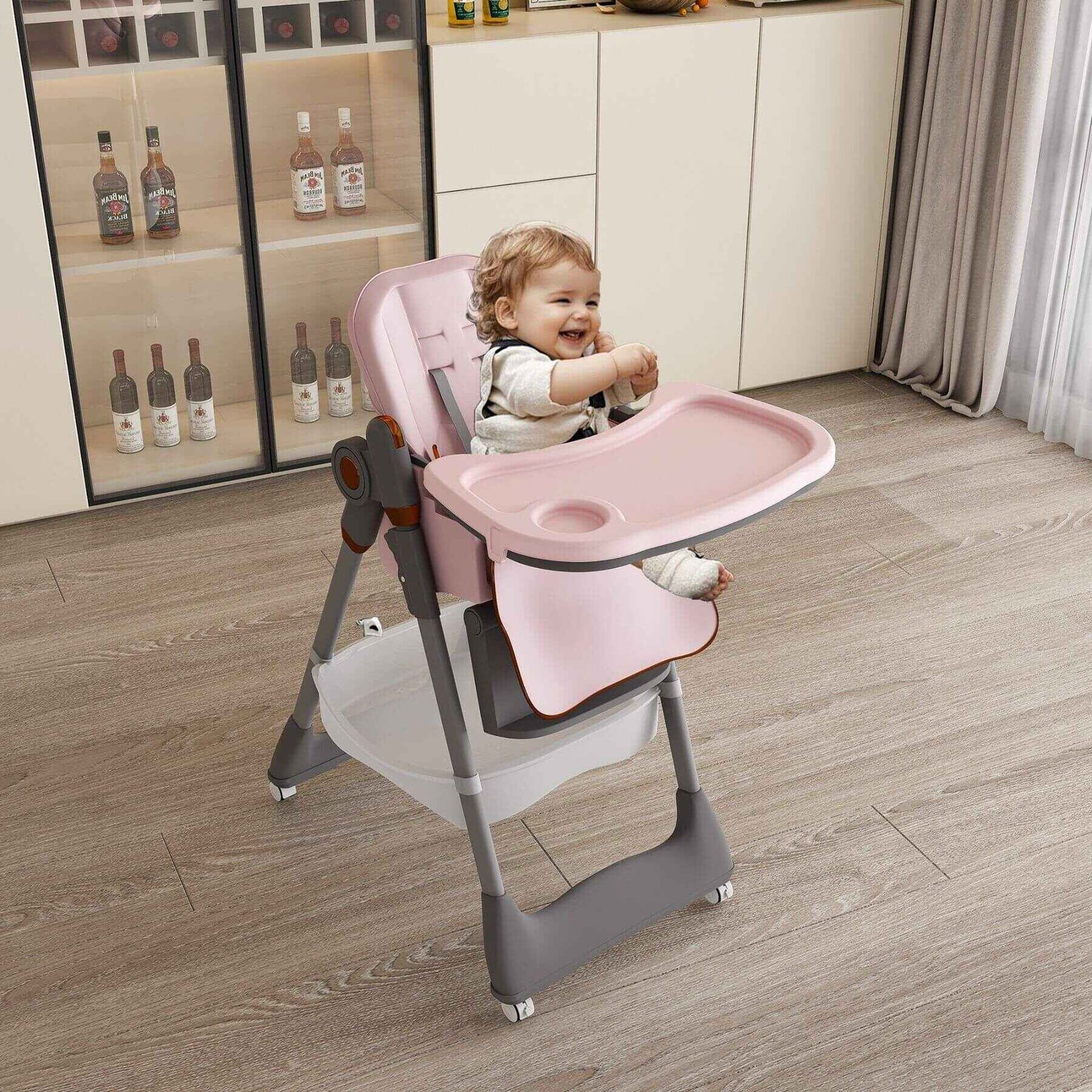 Child in Leavader Adjustable Baby High Chair - Pink in a kitchen setting