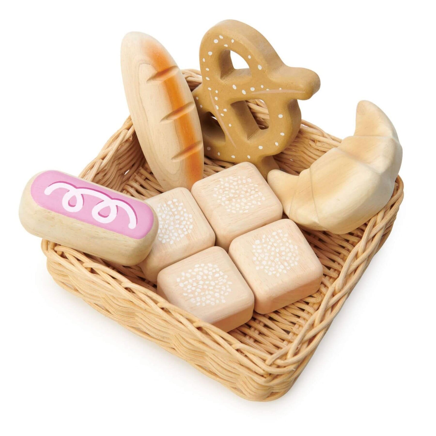 Wooden toy bread set in a wicker basket on a white background