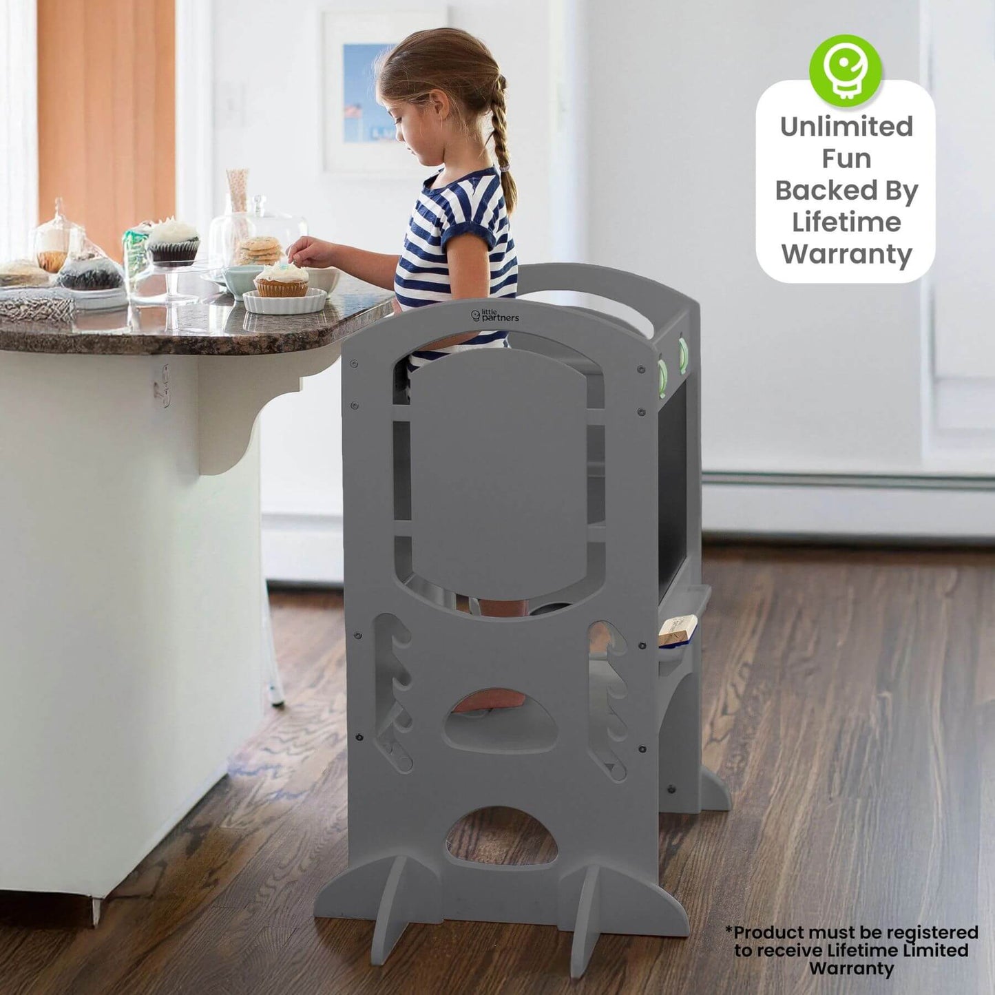 Girl Standing on Little Partners Limited Edition Learning Tower Grey, Cooking