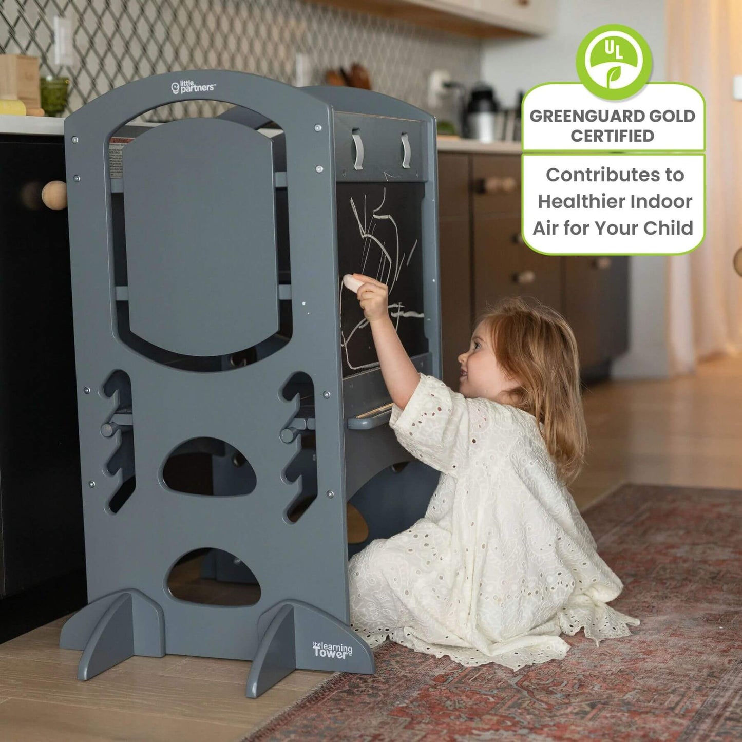 Girl Drawing on the Blackboard on Little Partners Limited Edition Learning Tower Grey