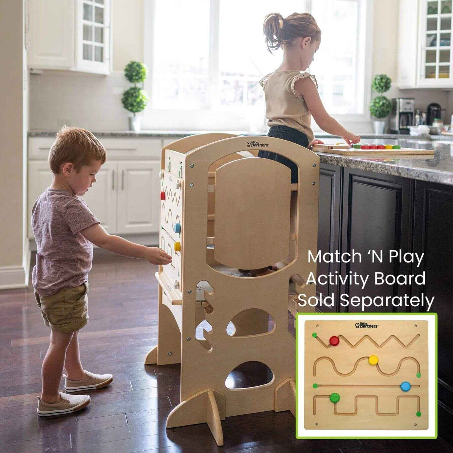 Girl Standing on Little Partners Limited Edition Learning Tower Natural w/ a boy Playing 'N Board Activity Board attached to the Tower