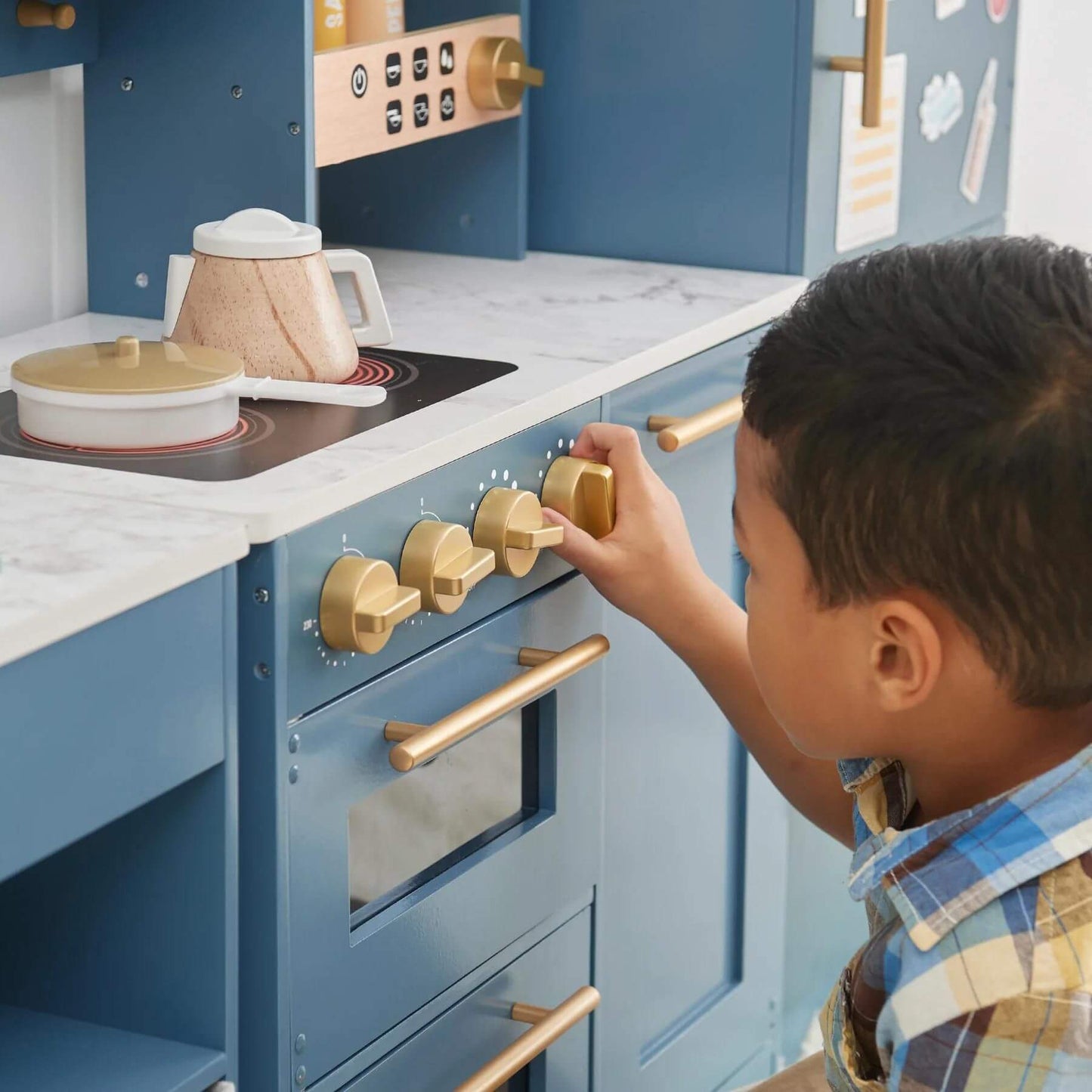 Boy Playing with Teamson Kids Little Chef Atlanta Large Modular Play Kitchen Blue