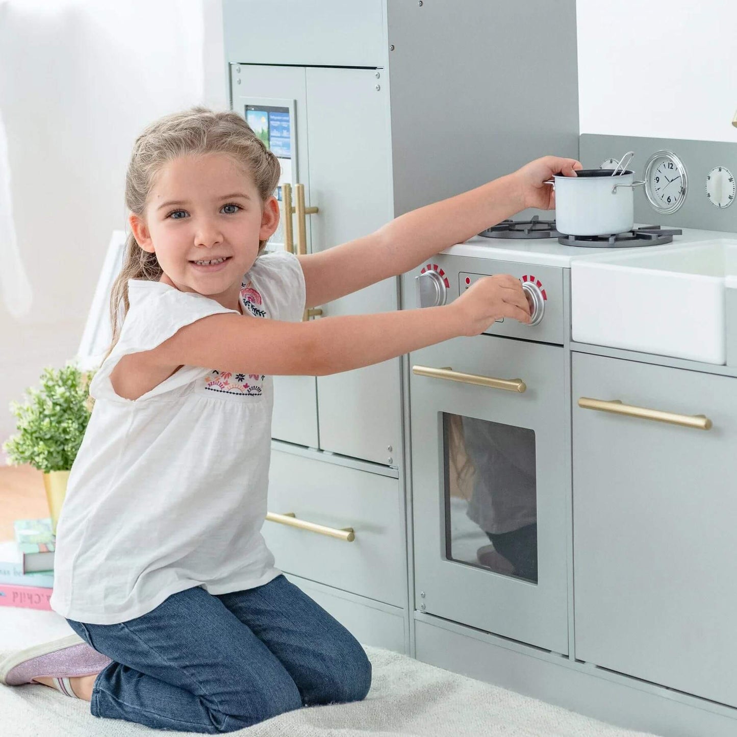 Girl Playing with Teamson Kids Little Chef Charlotte Modern Play Kitchen Gray/Gold