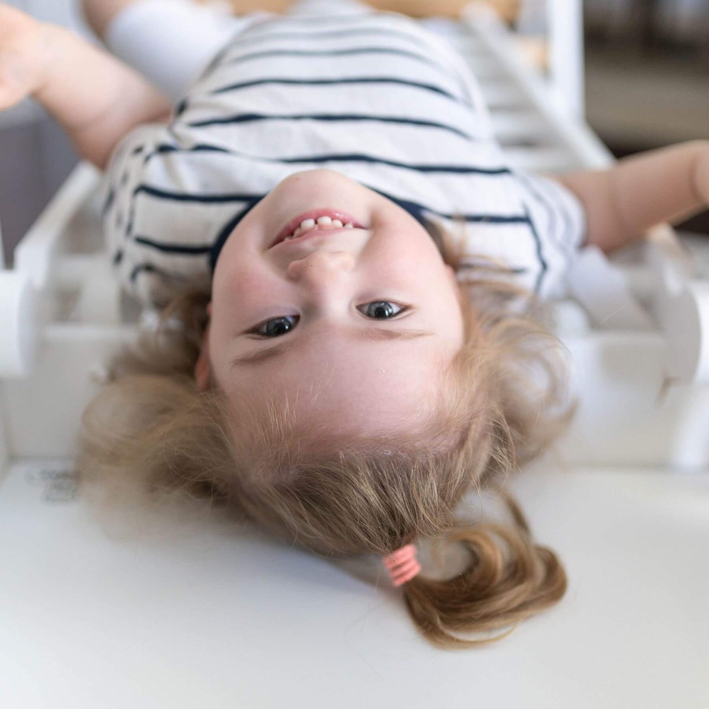 Girl Lying n Little Partners Climbing Ladder White