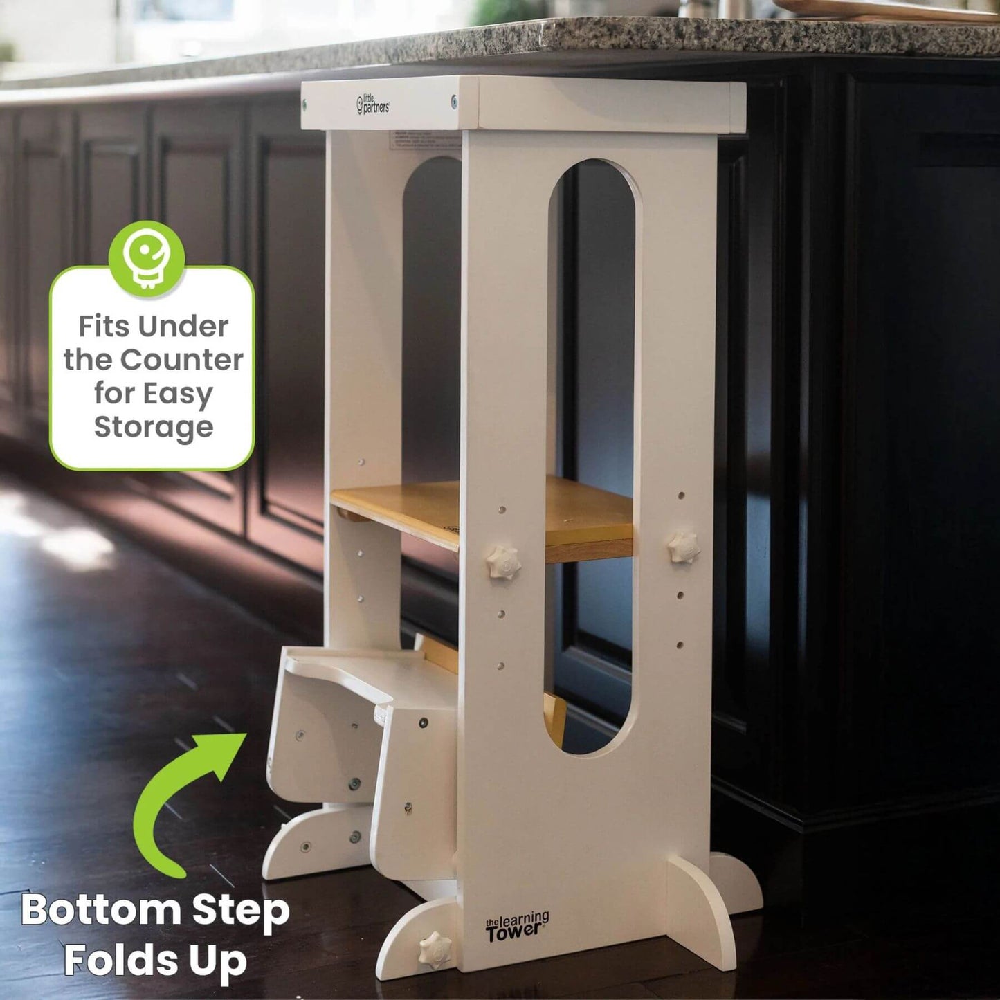Little Partners Explore 'N Store Learning Tower White & Natural next to Kitchen Counter