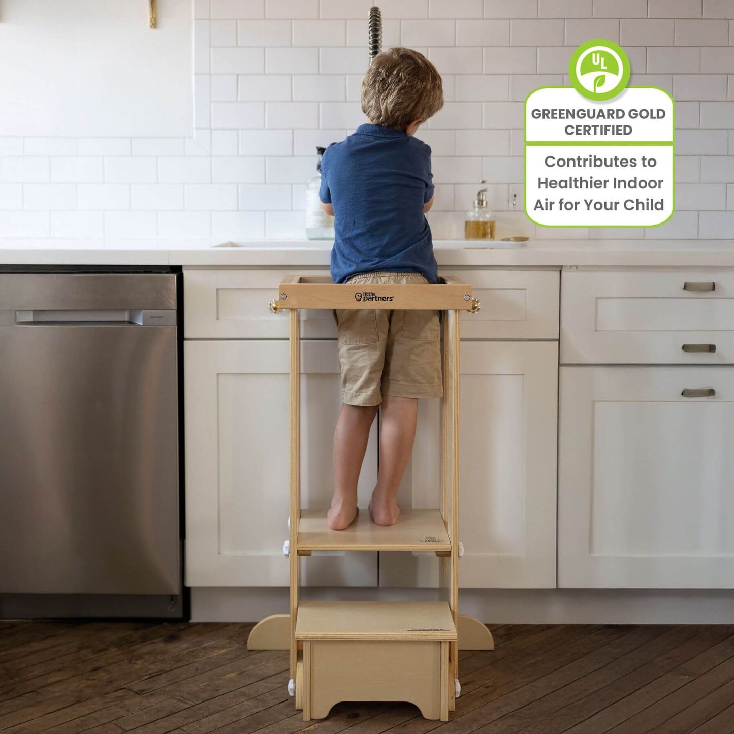 Boy Standing on Little Partners Explore 'N Store Learning Tower Natural