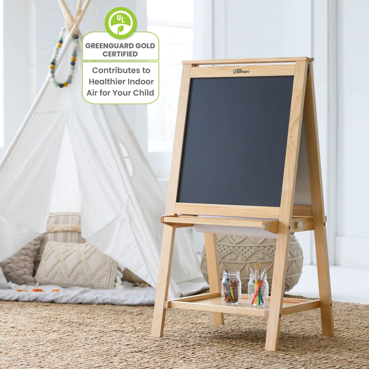 Little Partners Folding Artist EZ Easel Natural in a child's room with a tepee and toys.