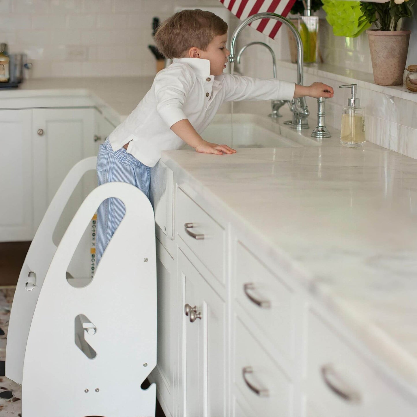 Boy Standing on Little Partners 3-in-1 Growing Step Stool White