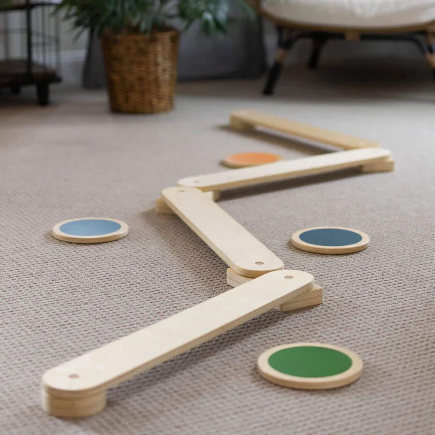 Little Partners Learn 'N Balance Set on a carpeted floor