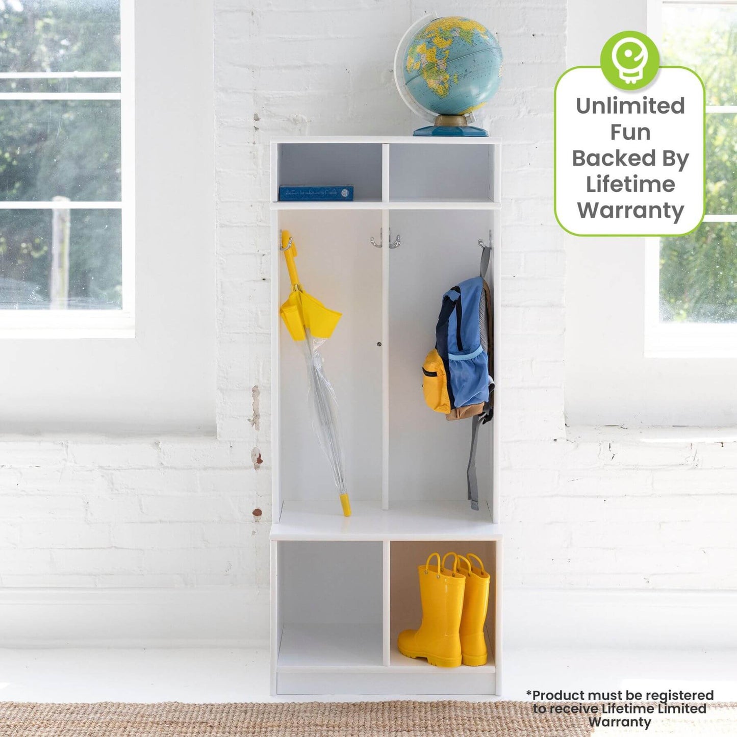 Little Partners Learn 'N Store Cubby with various items including a yellow raincoat, blue backpack, and yellow boots, with a globe on top, in a room with large windows.